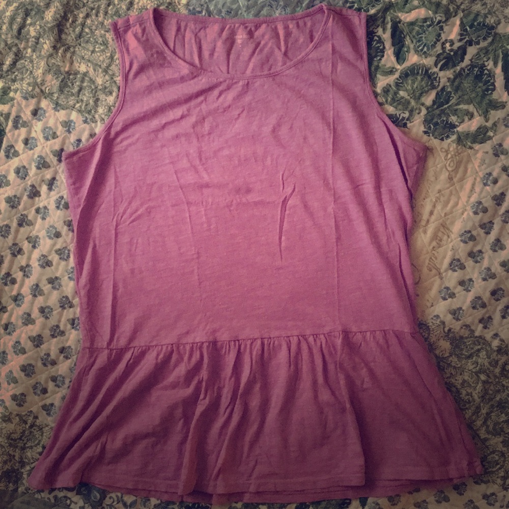 Lilac shell with peplum hem.
